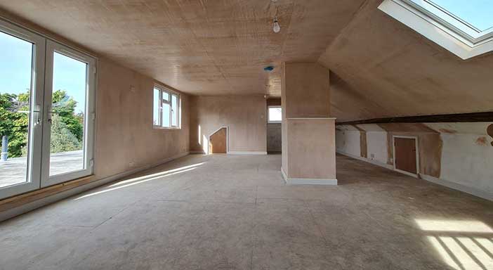 Plastering in large dormer conversion